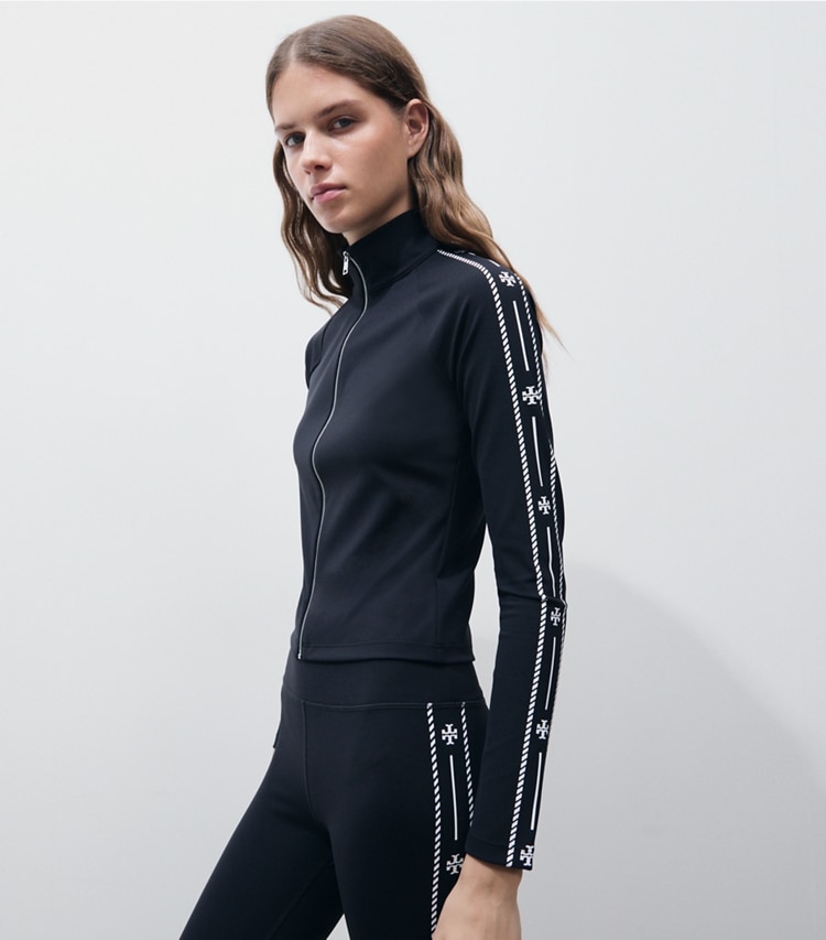 Tory Burch designer jackets Nylon Logo Trim Zip Top in BLACK on model detail