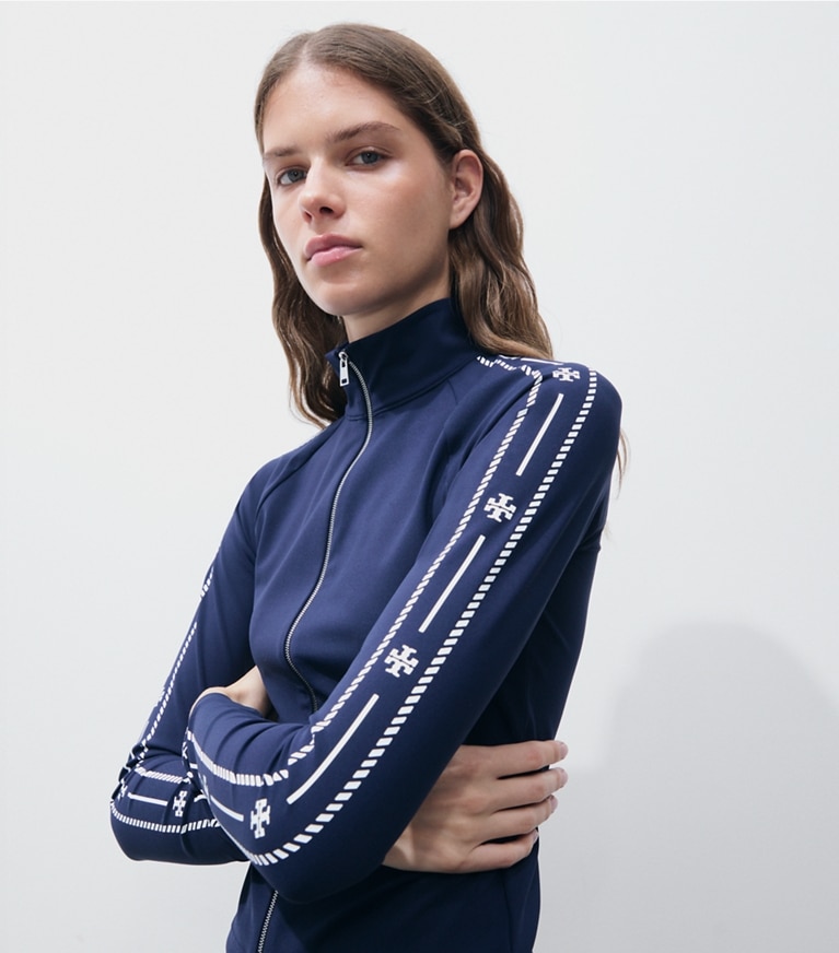Tory Burch designer jackets Nylon Logo Trim Zip Top in TORY NAVY on model detail
