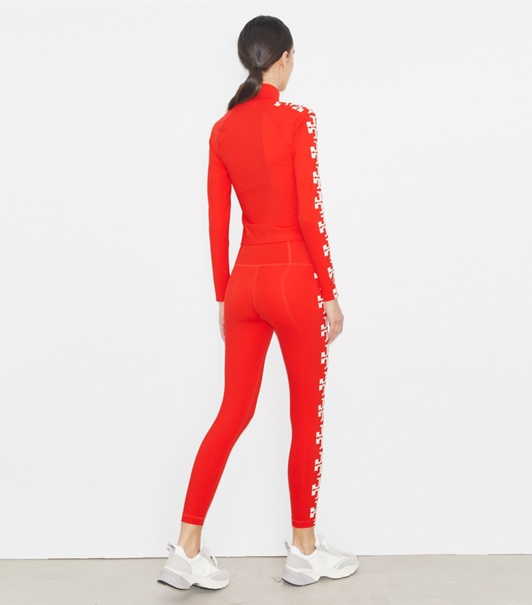 Tory Burch designer tops Nylon Logo Zip Top in Blazing Red on model back