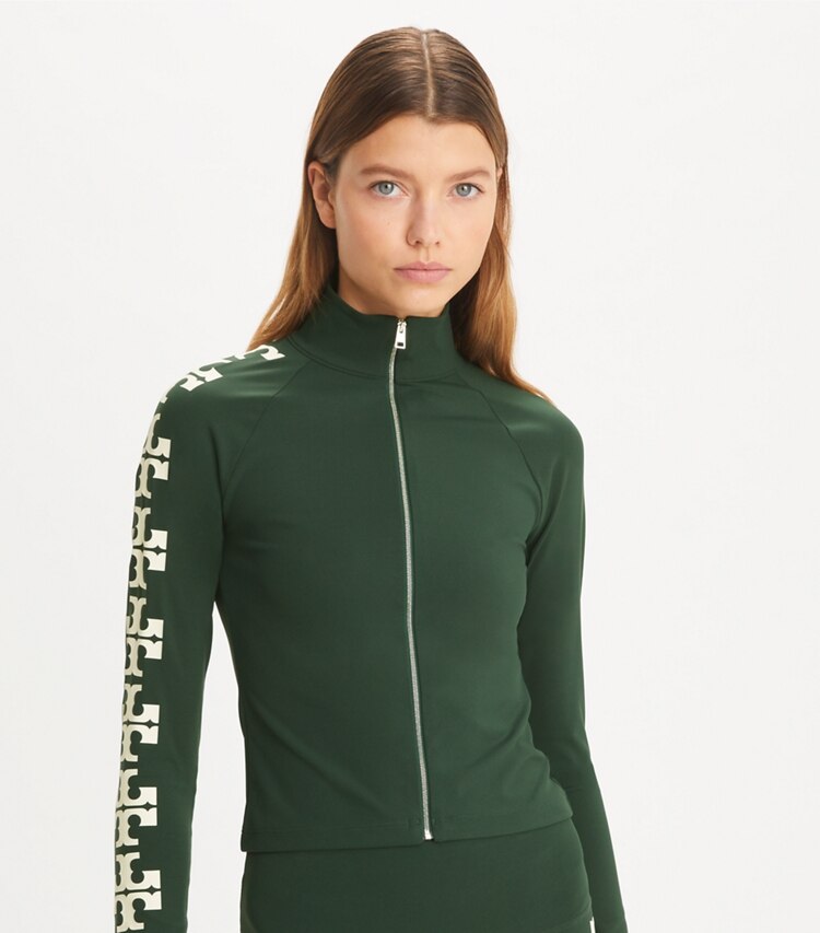 Tory Burch designer tops Nylon Logo Zip Top in Conifer on model detail