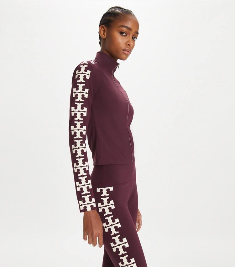 Tory Burch designer tops Nylon Logo Zip Top in Winetasting on model detail