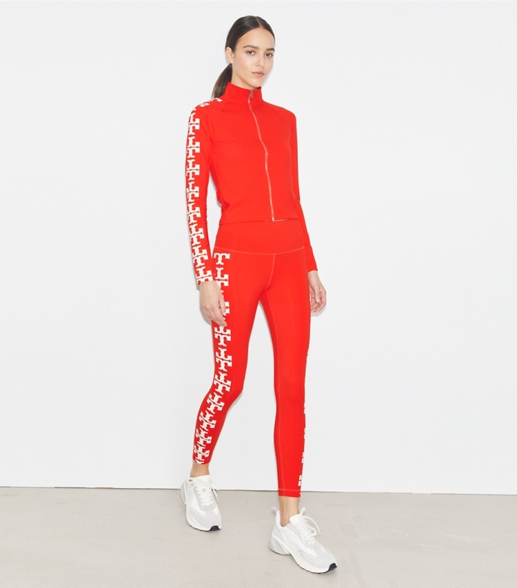Tory Burch designer tops Nylon Logo Zip Top in Blazing Red on model front