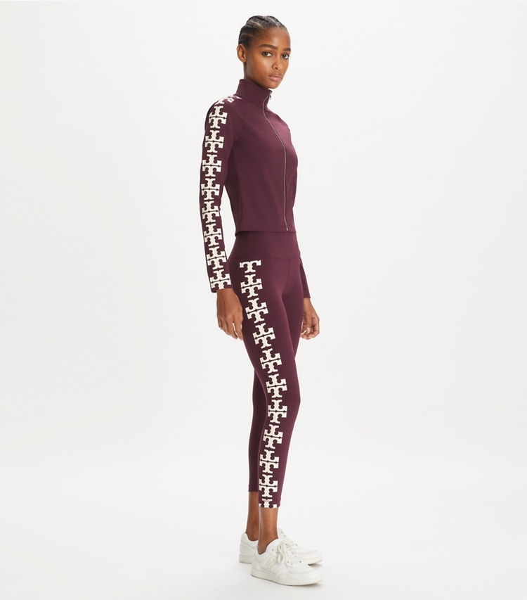 Tory Burch designer tops Nylon Logo Zip Top in Winetasting on model front
