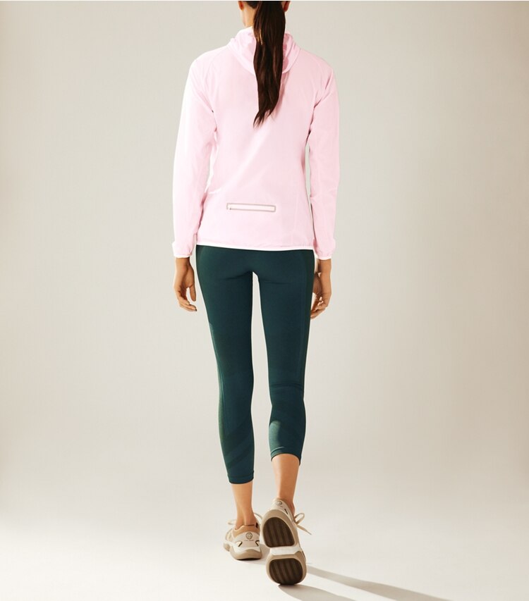 Tory Sport designer jackets Nylon Packable Jacket in Cotton Pink on model back