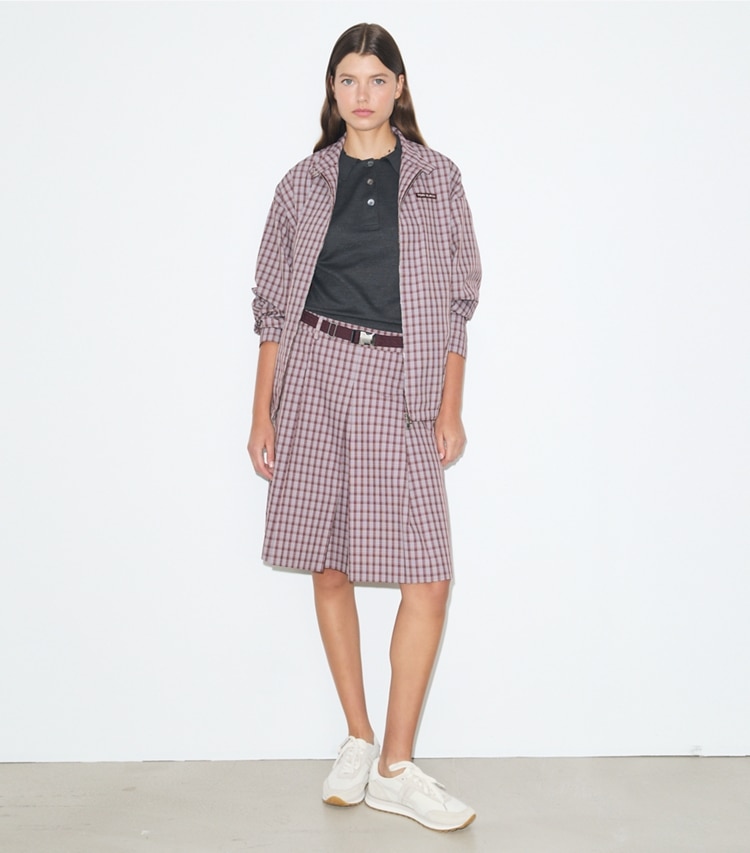 Tory Burch designer jackets Nylon Plaid Golf Jacket in Burgundy Plaid on model front