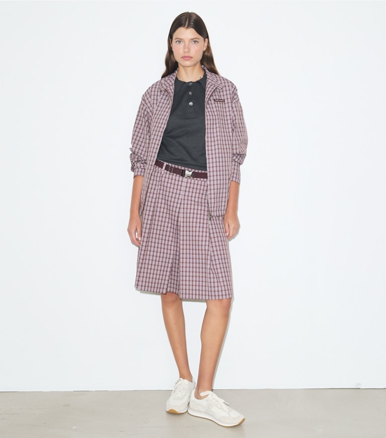 Tory Burch designer jackets Nylon Plaid Golf Jacket in Burgundy Plaid on model front