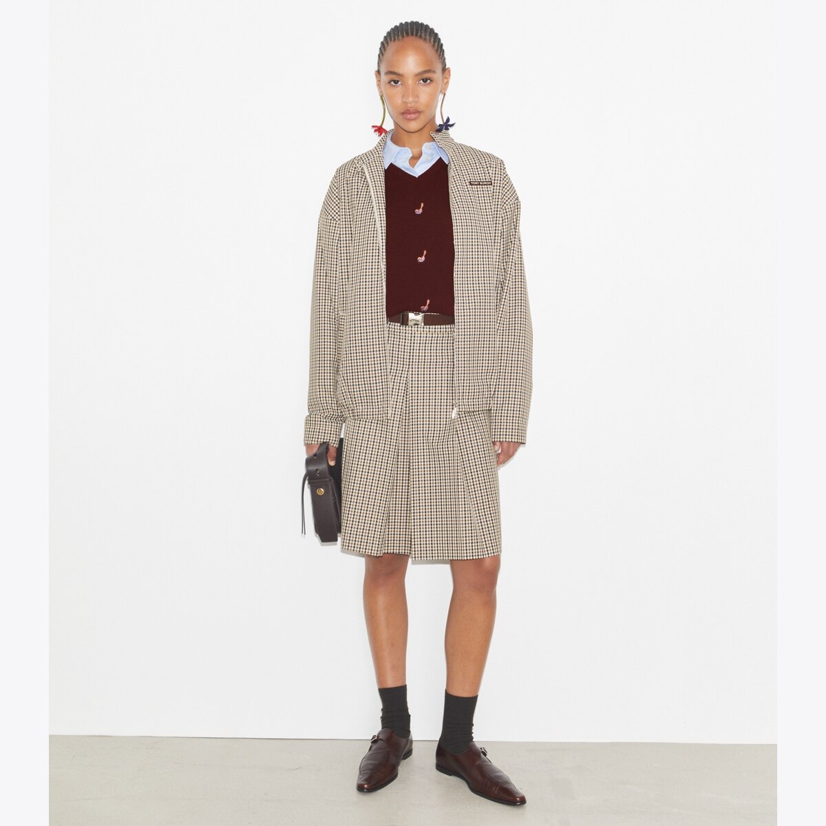 nylon-plaid-golf-jacket-on-