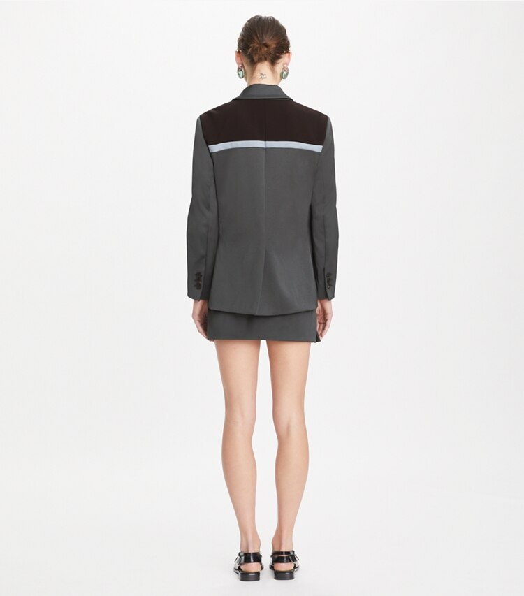 Tory Burch designer bottoms Nylon Ruffle Skirt in Coal Gray on model back