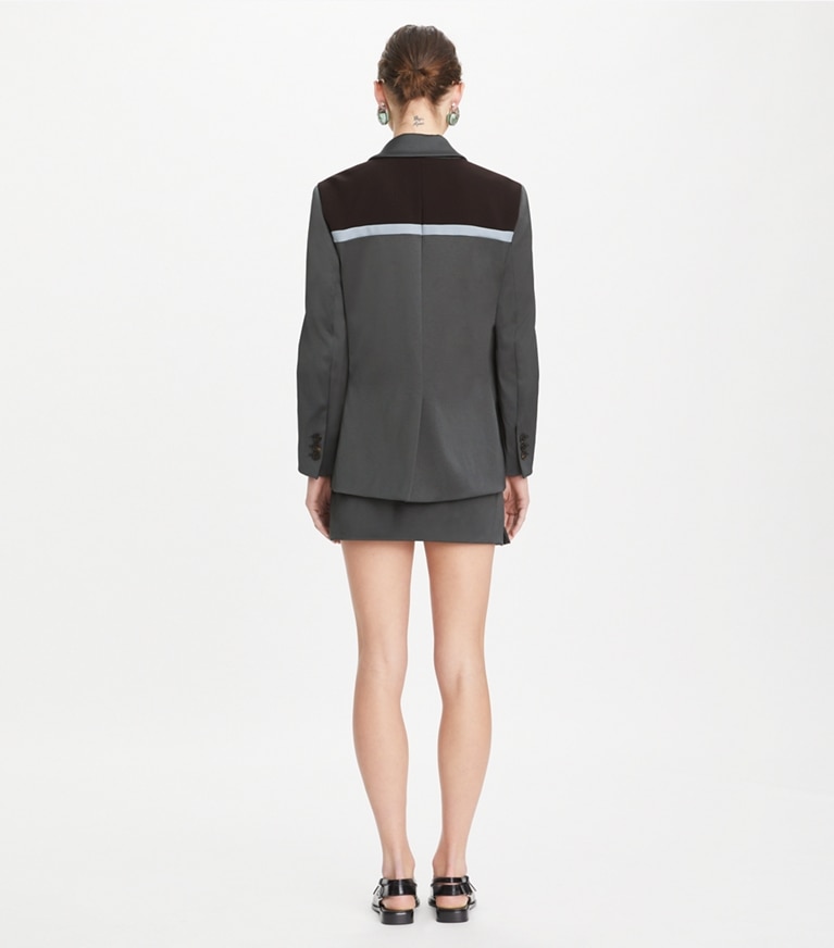 Tory Burch designer bottoms Nylon Ruffle Skirt in Coal Gray on model front