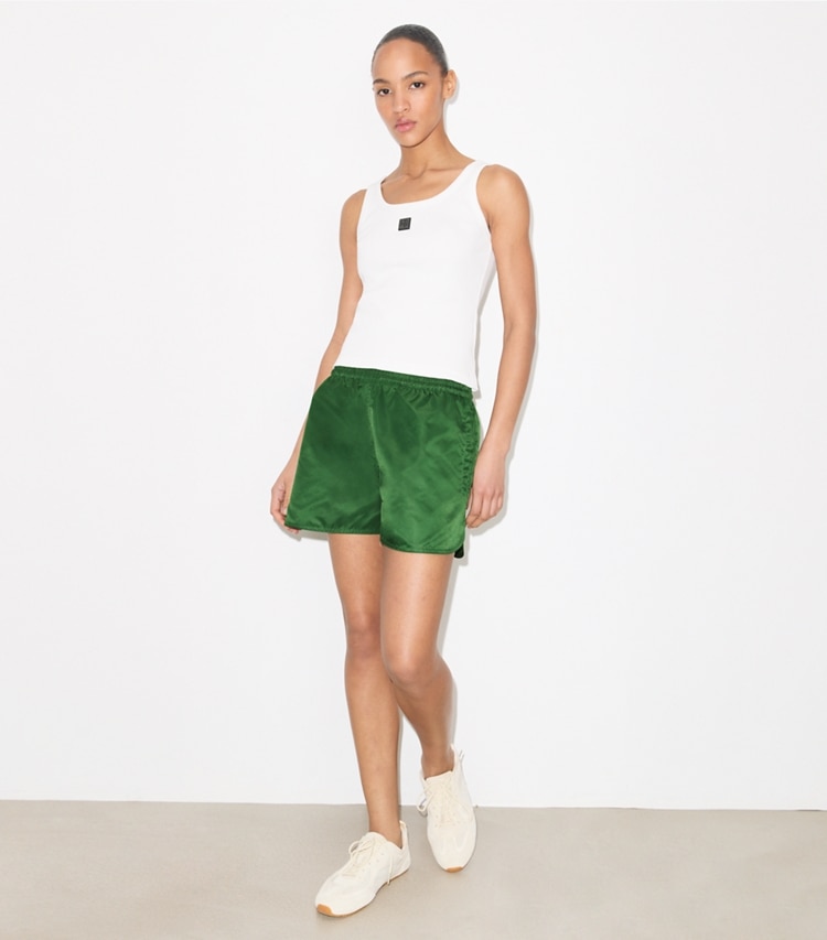 Tory Burch designer bottoms Nylon Shorts in Dark Green on model front