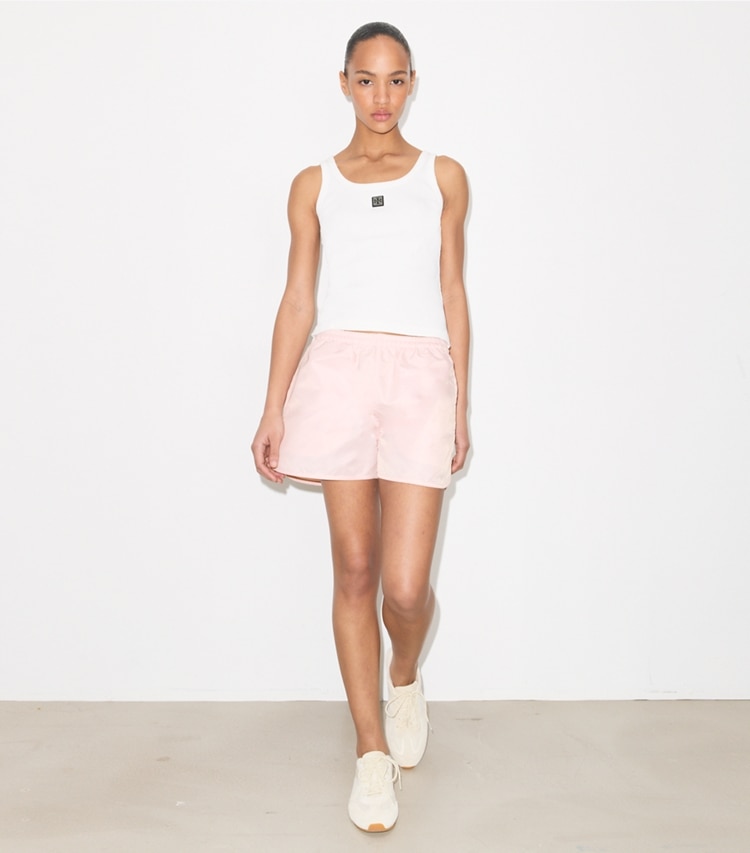 Tory Burch designer bottoms Nylon Shorts in Rose on model front