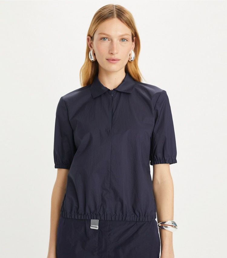 Tory Burch designer tops Nylon Taffeta Zip Polo in Royal Ink on model detail