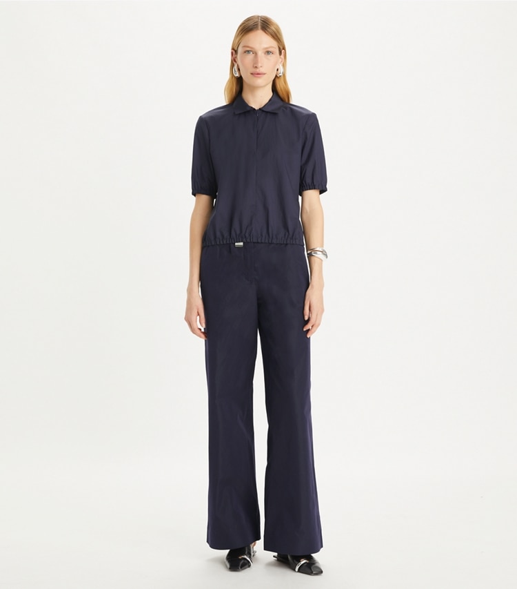 Tory Burch designer tops Nylon Taffeta Zip Polo in Royal Ink on model front