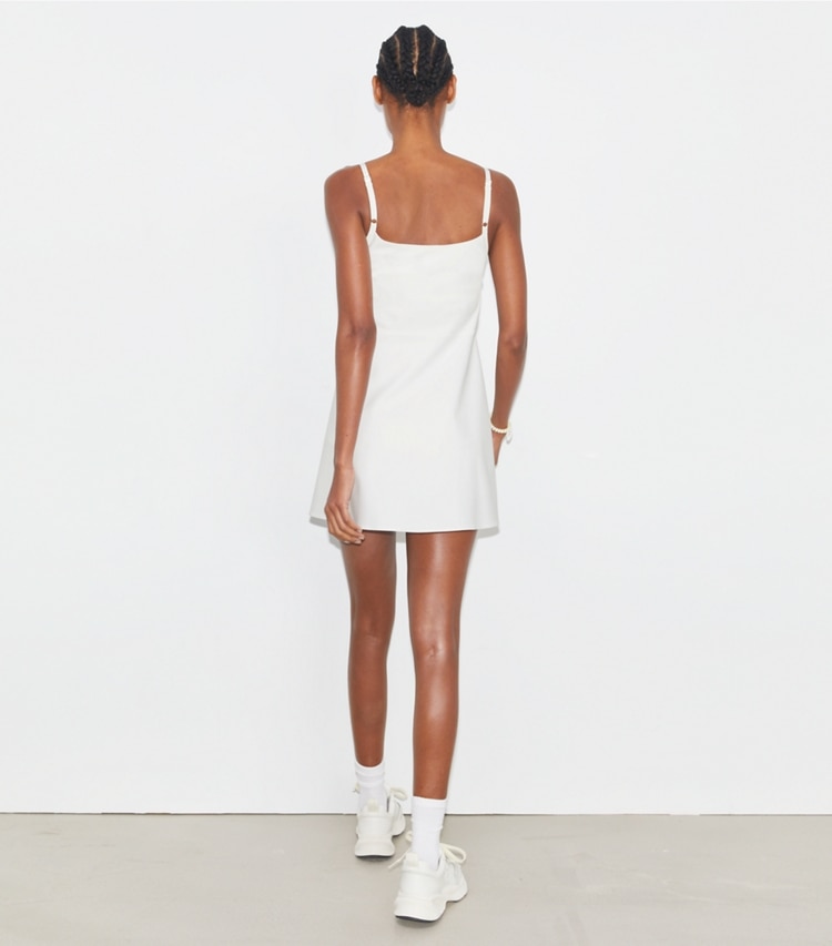 Tory Sport designer dresses Nylon Tennis Dress in Snow White on model back