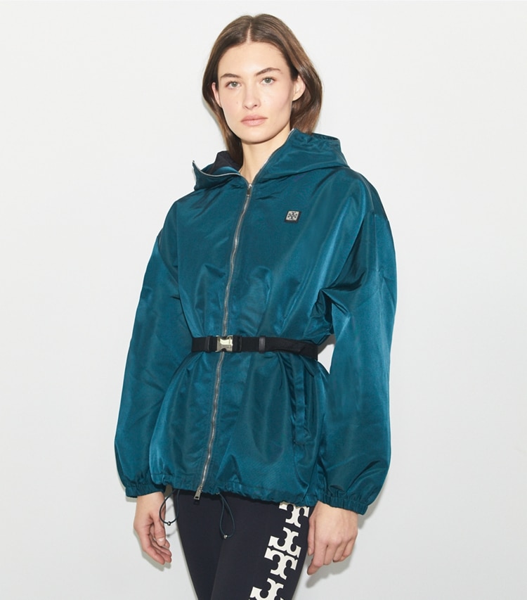 Tory Sport designer jackets Nylon Zip Anorak in Lagoon on model detail