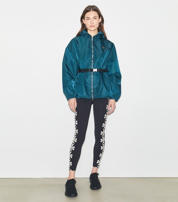 Tory Sport designer jackets Nylon Zip Anorak in Lagoon on model front