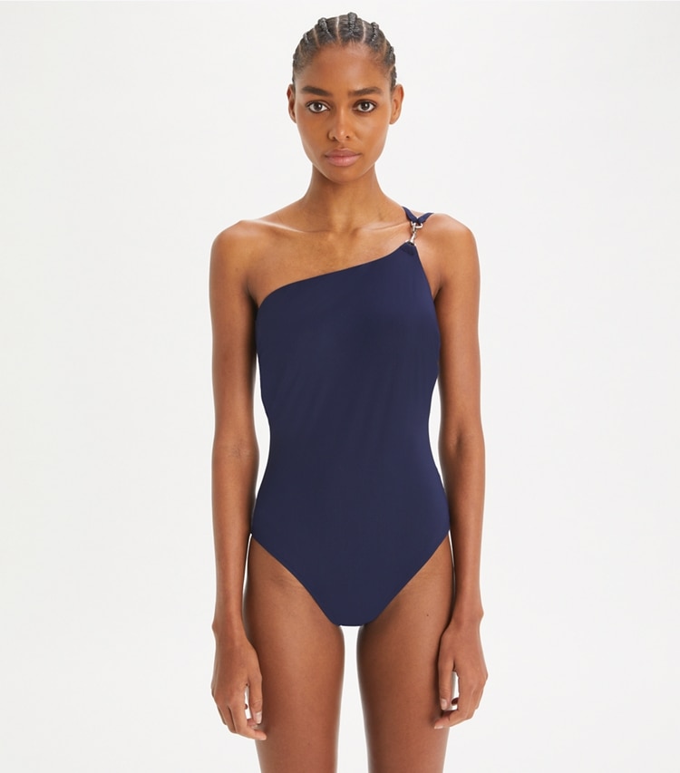 Tory Burch designer one pieces One-Shoulder Clip Swimsuit in Medium Navy on model detail