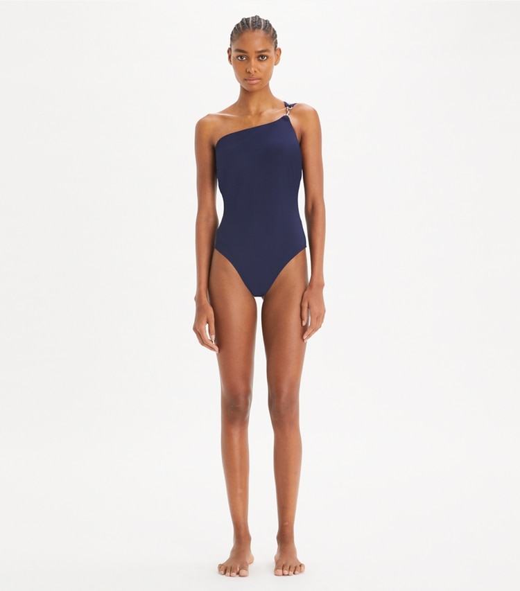 Tory Burch designer one pieces One-Shoulder Clip Swimsuit in Medium Navy on model front