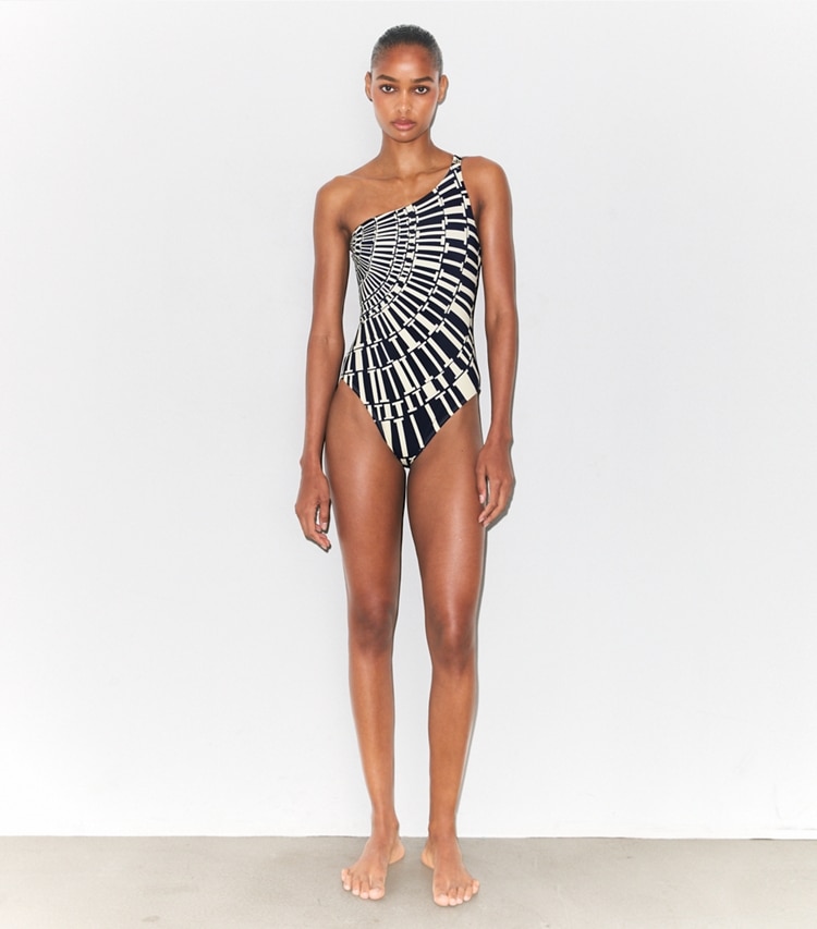 Tory Burch designer one pieces One-Shoulder Swimsuit in Medium Navy Circle T on model front
