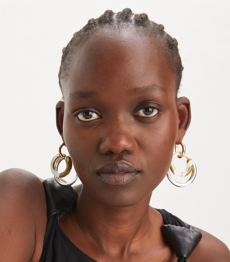 Tory Burch designer orecchini Orecchini Pierced in Light Silver / Light Brass / Green Swirl additional on model