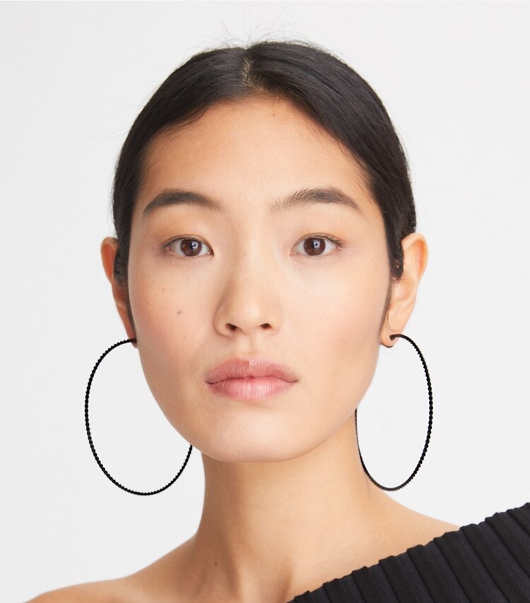 Tory Burch designer earrings Oversized Hoop Earring in Matte Black accessory on model