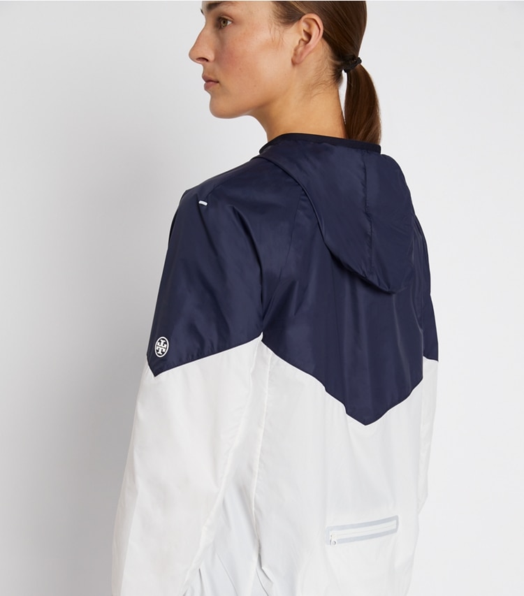 Tory Sport designer jackets Packable Nylon Chevron Anorak in Tory Navy/Snow White on model detail