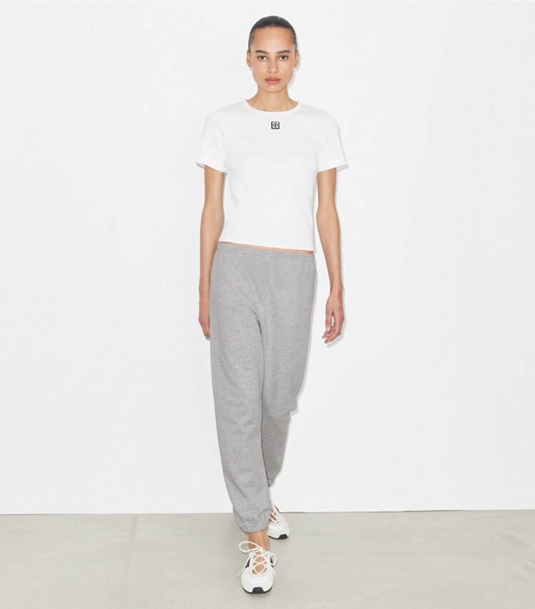 Tory Burch diseñador prendas inferiores Pantalón deportivo de felpa francesa en Medium Heather Gray frente en modelo