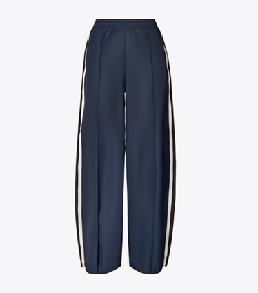 Tory Burch diseñador prendas inferiores Pantalón deportivo de nailon de pierna ancha en Medium Navy frente