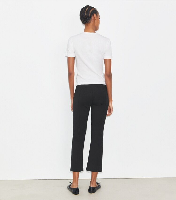 Tory Burch designer bas Pantalon Compression coupe 7/8 évasé in Black on model back