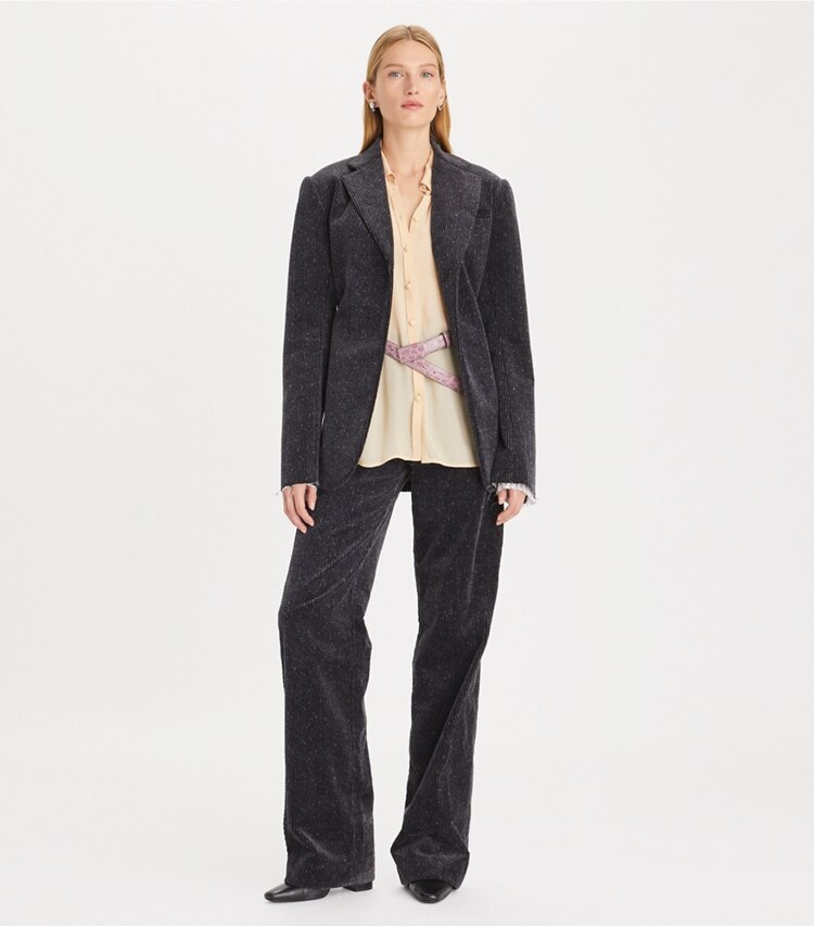Tory Burch designer bas Pantalon en velours côtelé à jambe large dans Flecked Charcoal sur modèle, de face