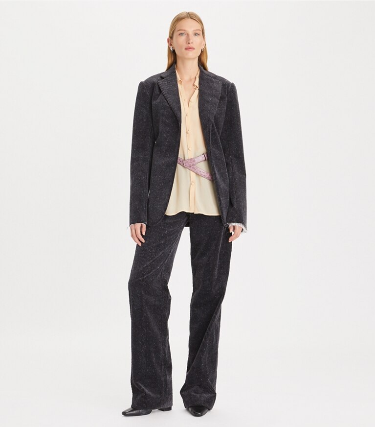 Tory Burch designer bas Pantalon en velours côtelé à jambe large dans Flecked Charcoal sur modèle, de face
