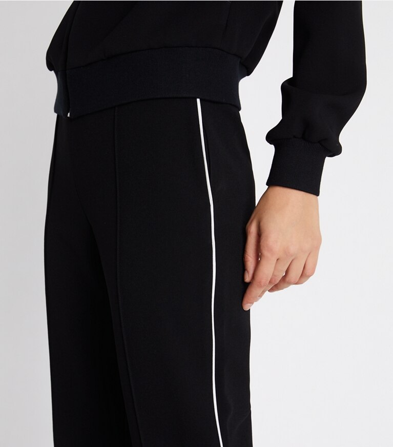 Tory Sport designer pantaloni Pantalone svasato con banda laterale in Black front