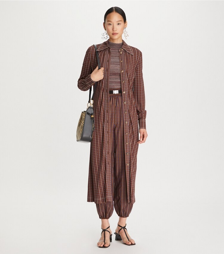 Tory Burch diseñador prendas inferiores Pantalones tobilleros con paneles de ventana y topos en Brown en el modelo (frente)