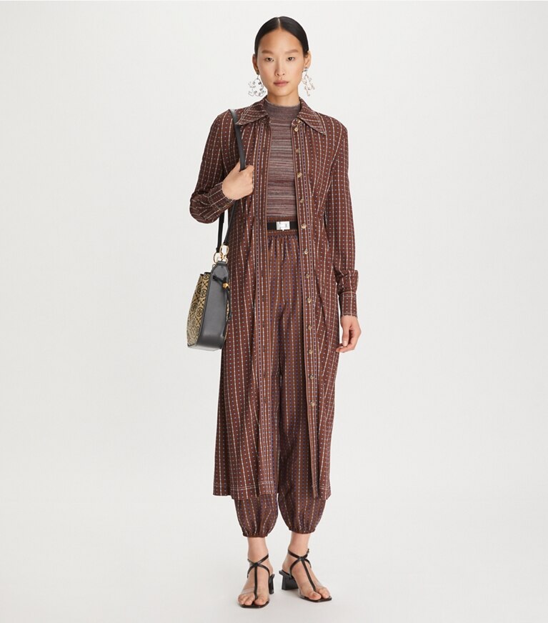 Tory Burch diseñador prendas inferiores Pantalones tobilleros con paneles de ventana y topos en Brown en el modelo (frente)