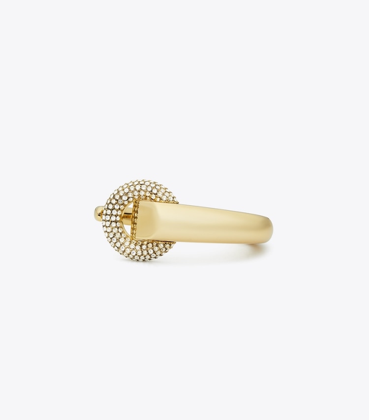 Tory Burch designer armbänder Pavé-Armspange mit Piercingdetail in Light Brass / Crystal front
