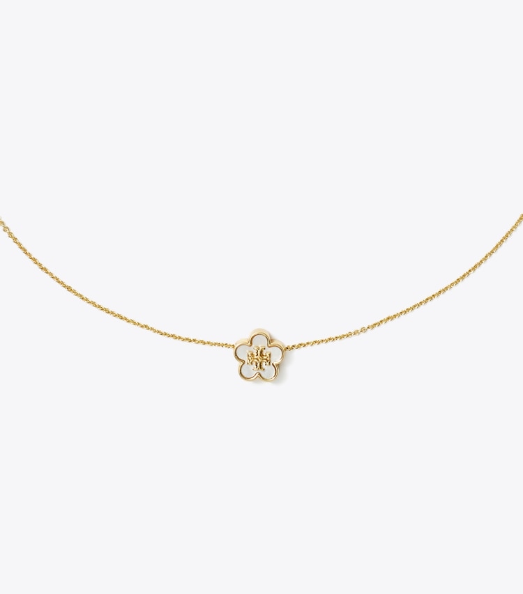 Tory Burch designer collane Pendente con fiore Forget Me Not in Tory Gold / Mother of Pearl dettaglio