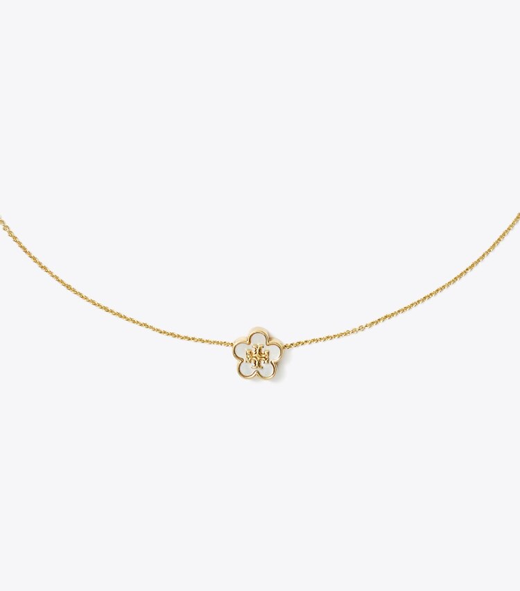 Tory Burch designer collane Pendente con fiore Kira in Tory Gold / Mother of Pearl dettaglio