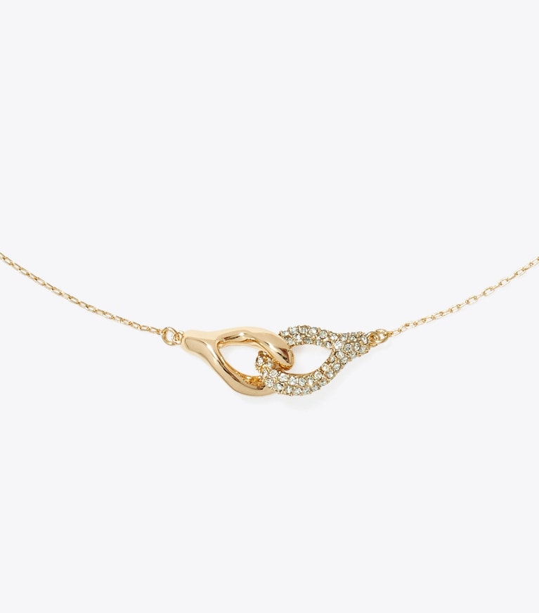 Tory Burch designer collane Pendente intrecciato portafortuna in Tory Gold / Crystal front