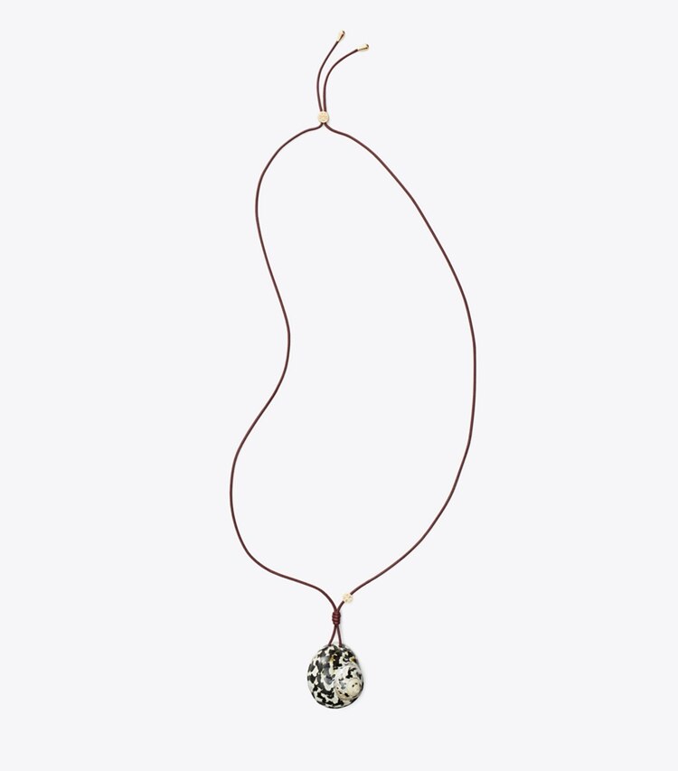 Tory Burch designer colliers Pendentif coquillage dans Black / White de face