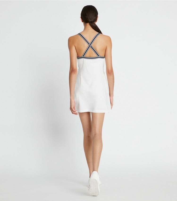 Tory Sport designer dresses Performance Jersey Cross-Back Tennis Dress in Snow White on model back