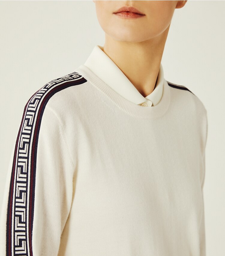 Tory Sport designer sweaters Performance Merino Geo-T Sweater in Snow White on model detail