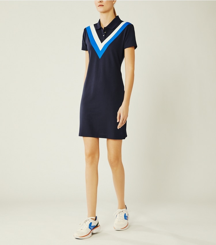 Tory Sport designer dresses Performance Piqué Chevron Polo Dress in Tory Navy/Surf Blue on model front