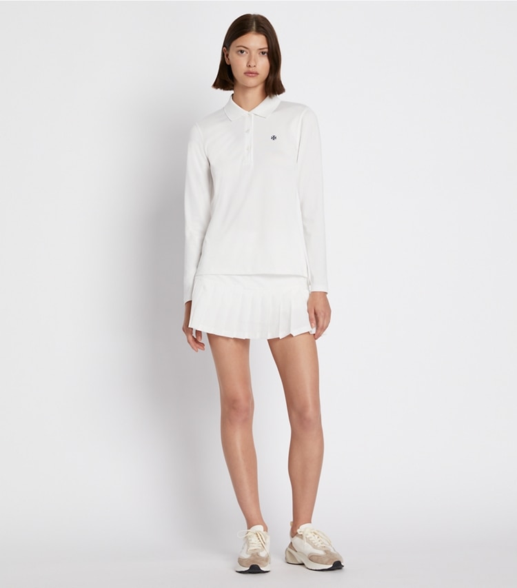 Tory Sport designer tops Performance Piqué Long-Sleeve Polo in Snow White on model front