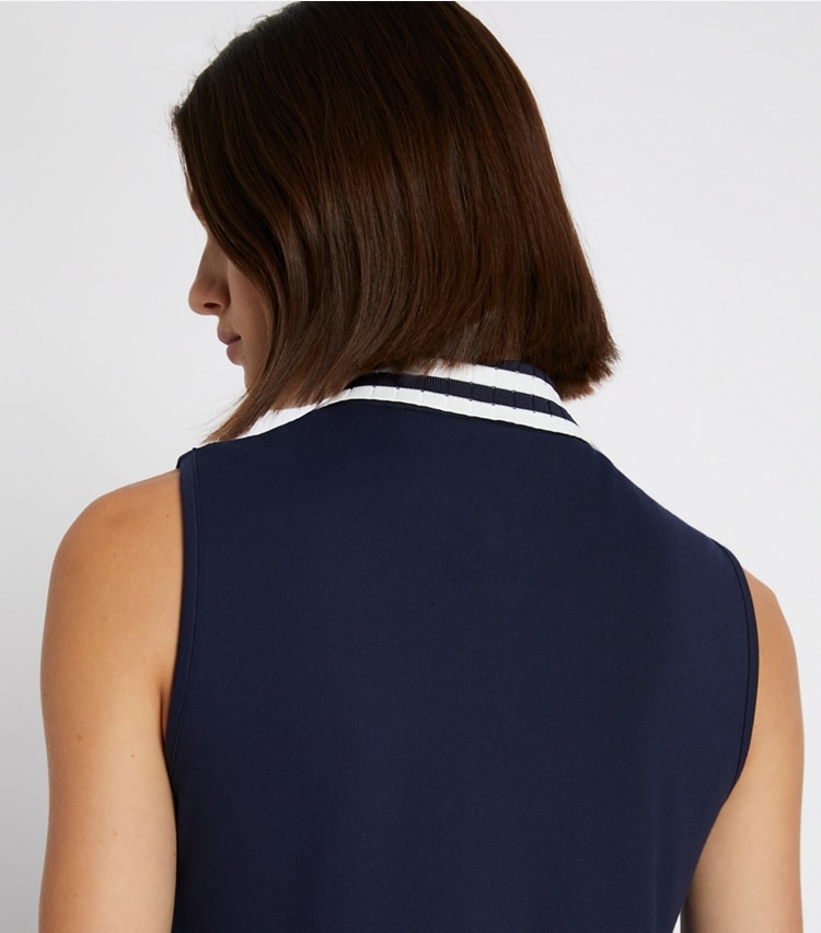 Tory Sport designer tops Performance Piqué Pleated Collar Sleeveless Polo in Tory Navy/Snow White on model detail