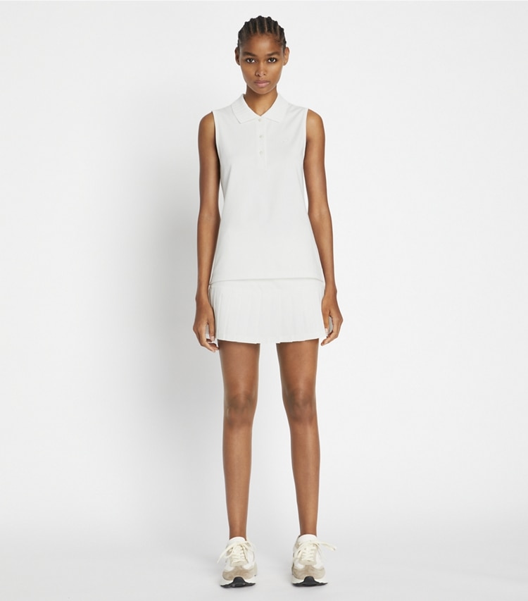 Tory Sport designer tops Performance Piqué Pleated Collar Sleeveless Polo in Snow White / Snow White on model front