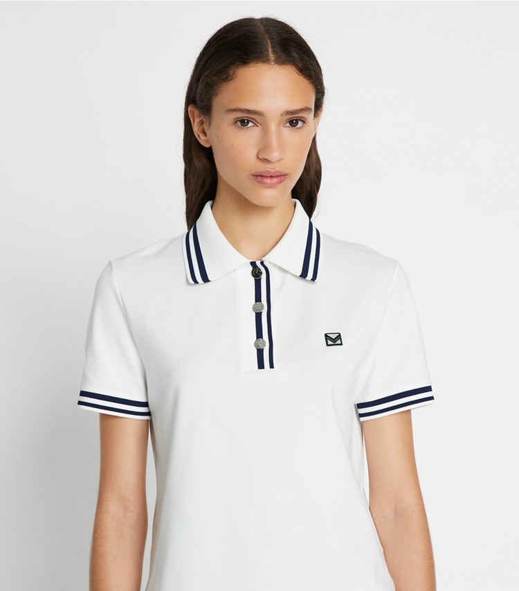 Tory Sport designer tops Performance Piqué Polo in Snow White / Tory Navy on model detail