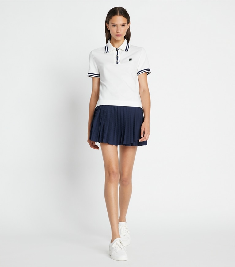 Tory Sport designer tops Performance Piqué Polo in Snow White / Tory Navy front