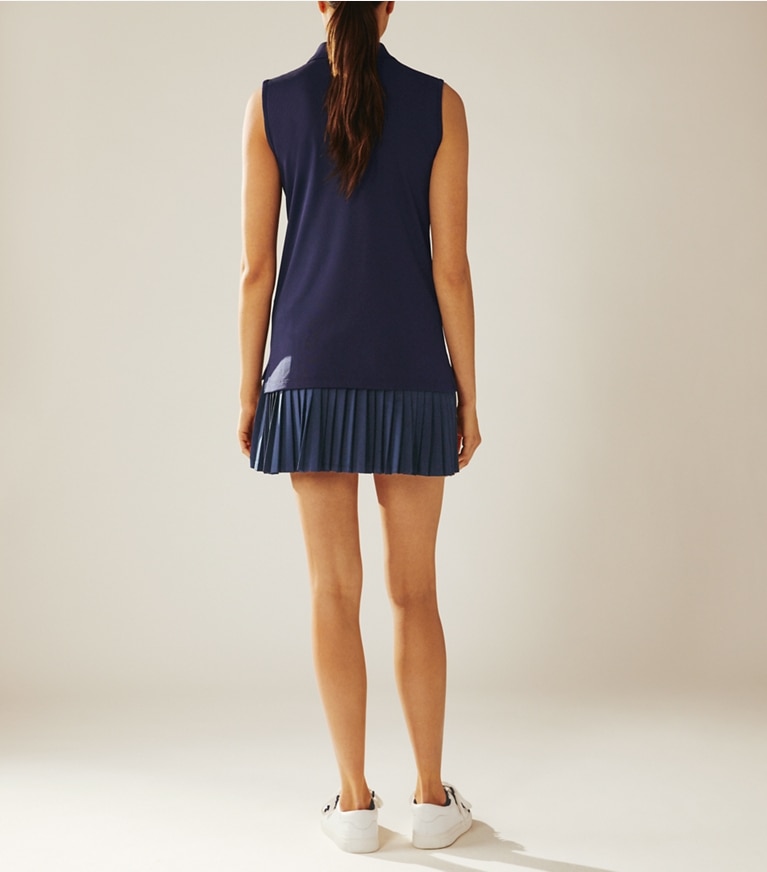 Tory Sport designer tops Performance Piqué Sleeveless Polo in Tory Navy on model front
