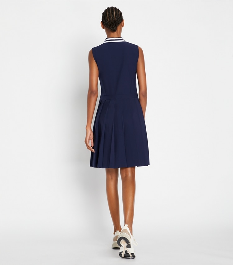 Tory Sport designer dresses Performance Pleated Collar Golf Dress in Tory Navy on model back