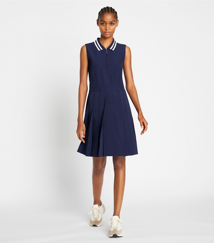 Tory Sport designer dresses Performance Pleated Collar Golf Dress in Tory Navy on model front